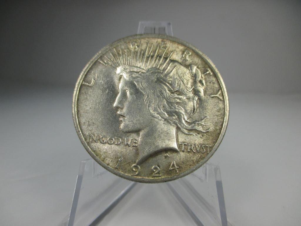 h-1 AU 1924-P Peace Silver Dollar.
