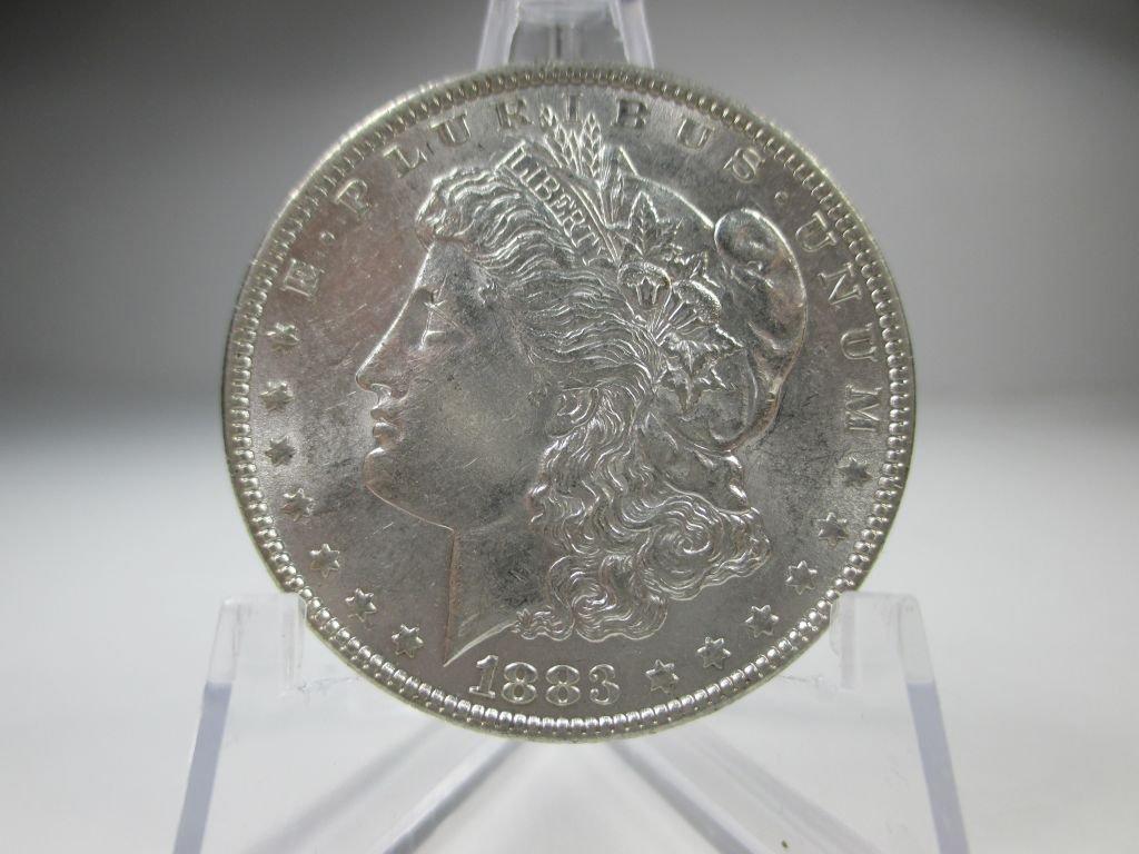 jr-22 AU 1883-P Morgan Silver Dollar. Nice mint luster and good details