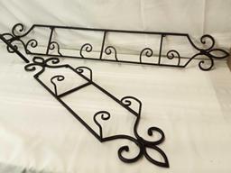 2 METAL WALL SHELVES FOR PLATES OR DECORATIVE ITEMS PICK UP ONLY.
