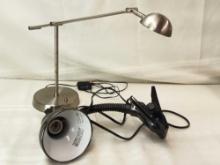 DESK LAMPS. SILVER ONE WORKS, IS ADJUSTABLE, BLACK ONE IS CLIP-ON STYLE UNTESTED.