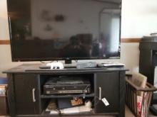 BLACK ENTERTAINMENT CENTER WITH SEIKI 48" TV, NEWSPAPER HOLDERS ON SIDES IN