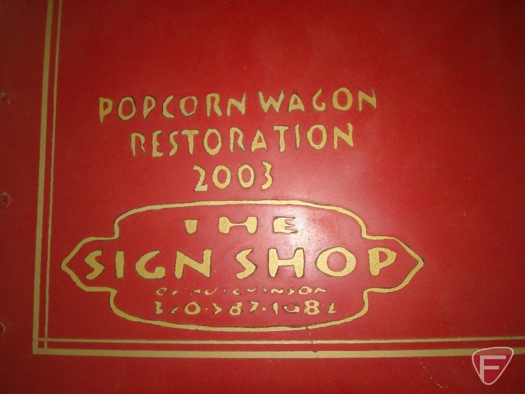 Vintage-style popcorn concession wagon, awning, lights, flagpole with American Flag,