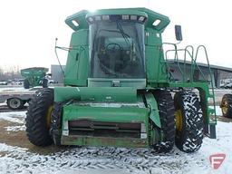 1992 John Deere 9600 combine with flared tank extension, 520/85R42 rubber and duals, 14.9x24 rears