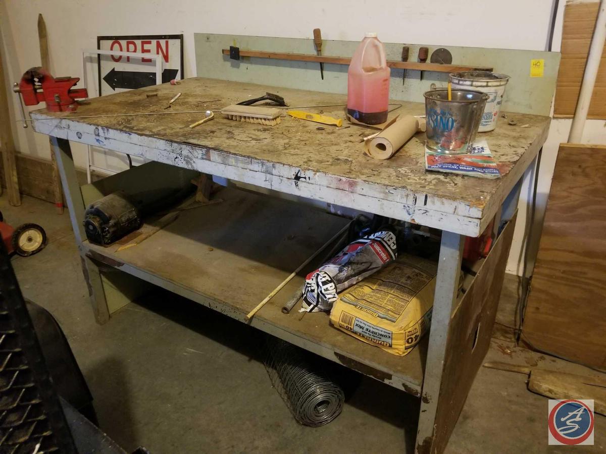 Hand crafted wood work bench with undershelf and backing. Contents included