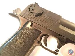 Manufacturer: ISI Magnum Research Model: Desert Eagle Caliber: 50 AE Serial #: 9520853 Type: S/A