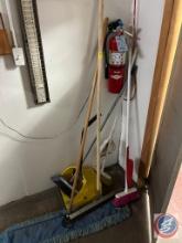 brooms and fire extinguisher