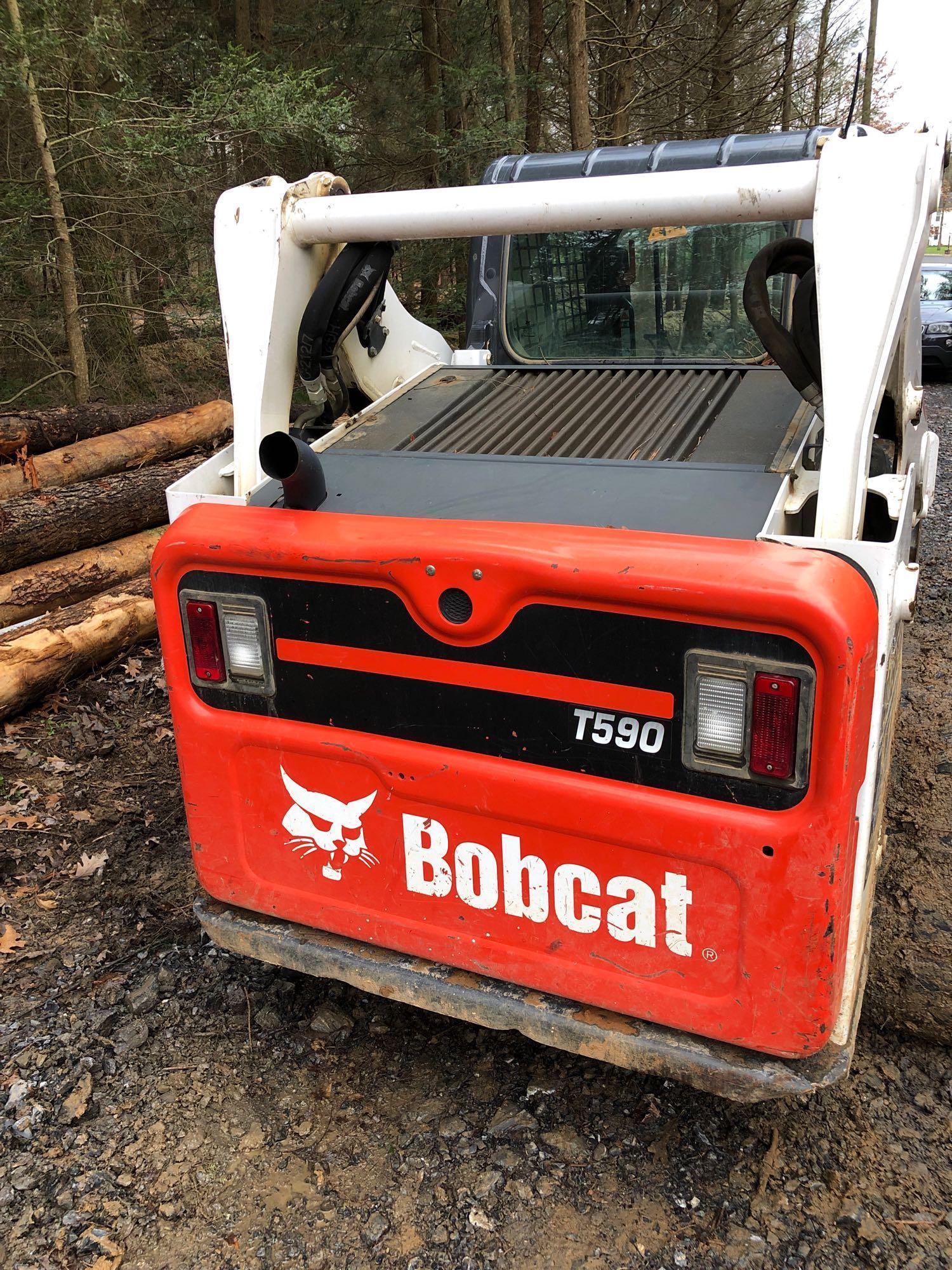 BOBCAT(T590)(rubber tracks,pallet forks,contractor bucket/tooth bar,766 hours)Work ready*see video*