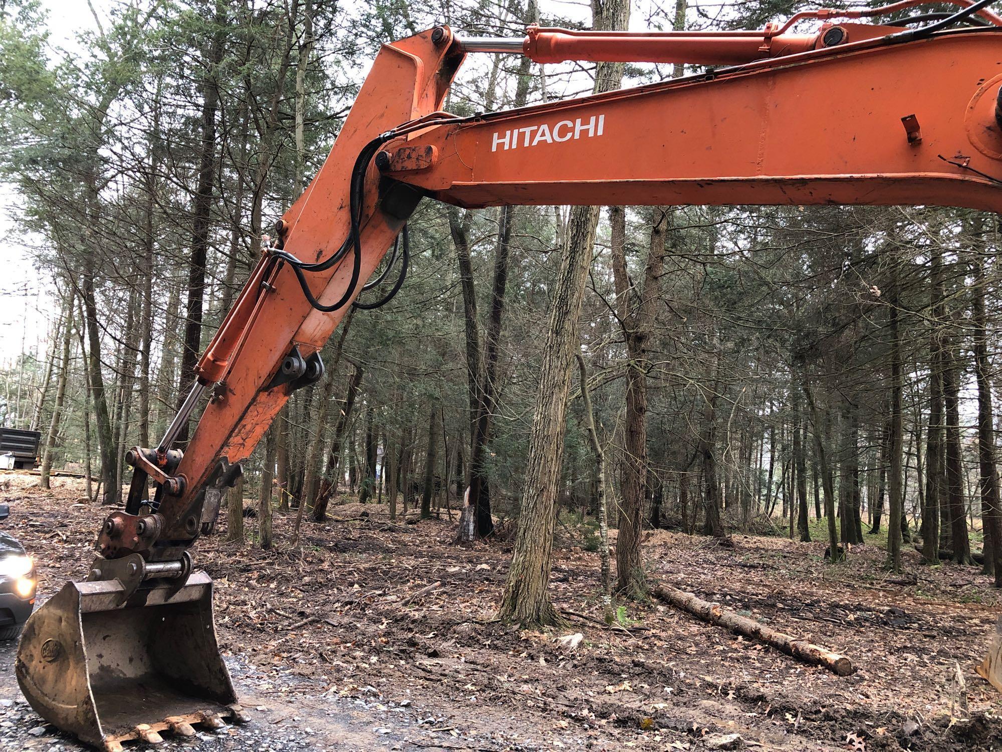HITACHI track hoe(EX160LC;new main boom/42" tooth bucket;incab bucket disconnect;(6170 hours)