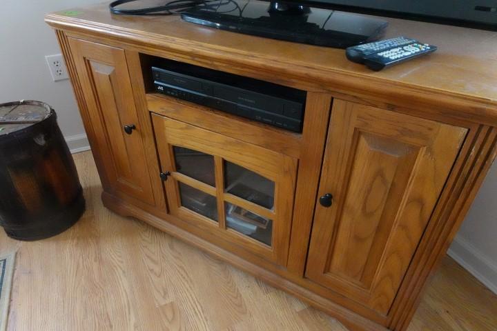 OAK ENTERTAINMENT CENTER INCLUDING VCR DVD  AND MORE  22 X 45 X 30 INCH