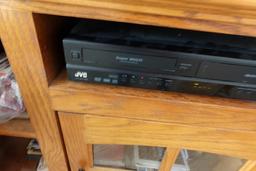 OAK ENTERTAINMENT CENTER INCLUDING VCR DVD  AND MORE  22 X 45 X 30 INCH