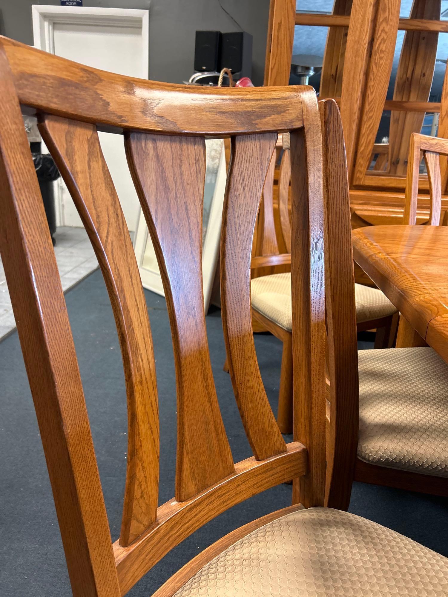 Beautiful 11 piece solid oak dining room set