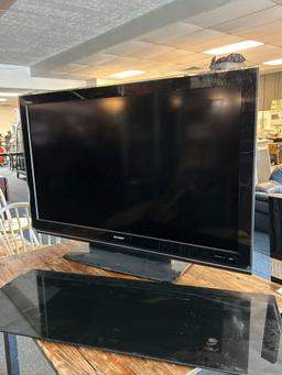 older plasma, TV, 52 inch with stand
