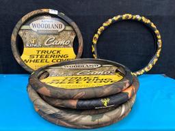 9 camouflage steering wheel covers and 1 sunflower