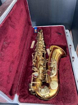 Antique king alto saxophone in case