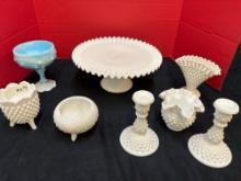 Collection of milk glass cake plates vases candlesticks etc.