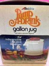 Aladdin gallon jug with built-in cold drink dispenser