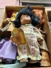 box of vintage dolls