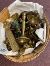 Basket full of brass items