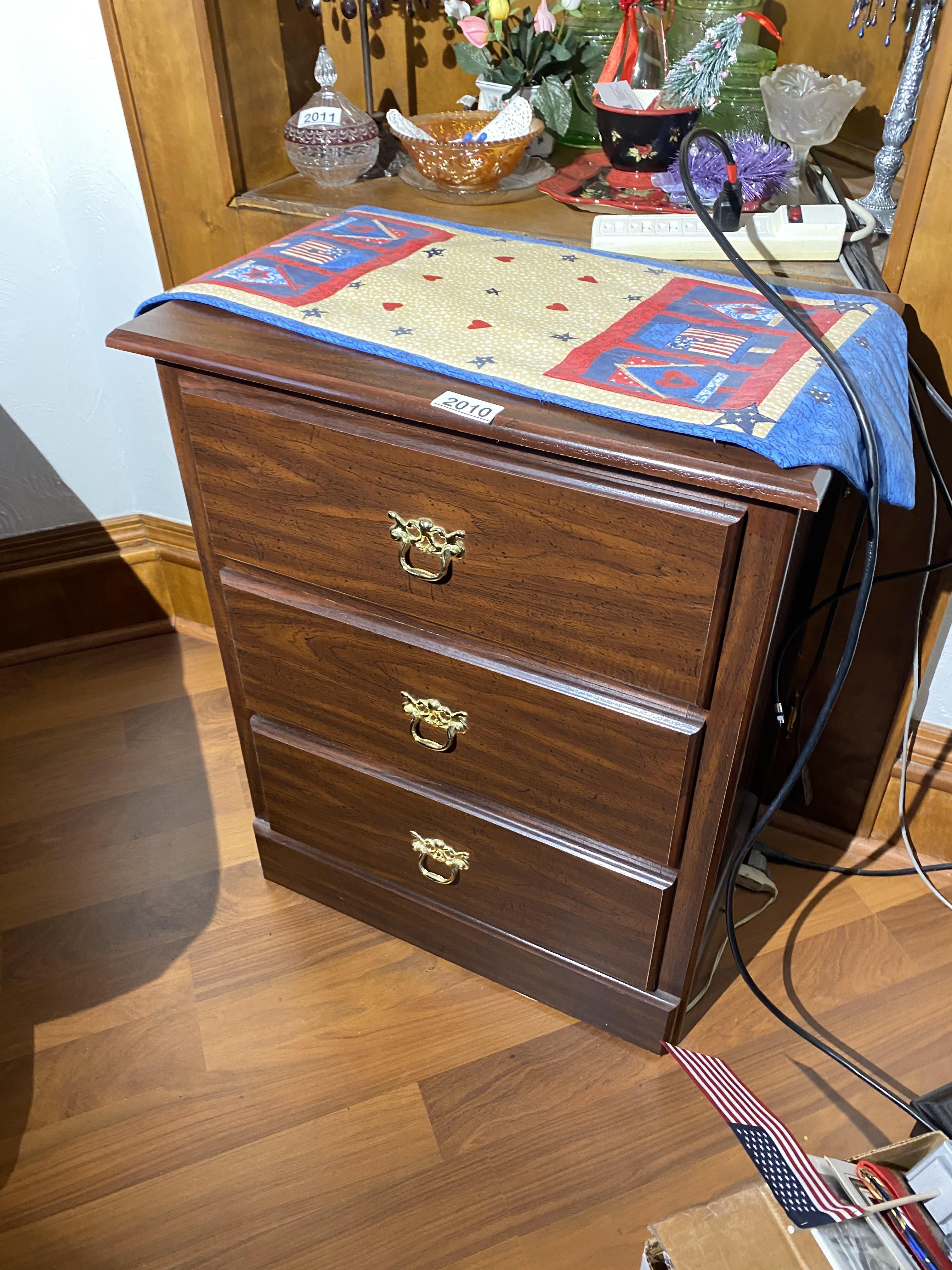 Small cabinet with three drawers