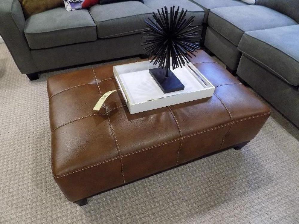 Leather style ottoman with tray and decor
