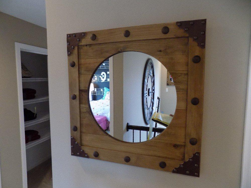 2 wood-framed mirrors