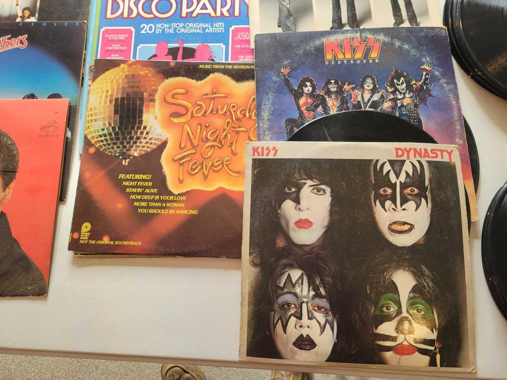 Group of vintage LPs and albums, Bee Gees picture album, Kiss, Doobie Brothers, Elvis, Saturday