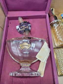 Group of vintage perfumes and and beauty items