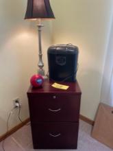 wooden filing cabinet, Insignia paper shredder, lamp and alarm radio clock