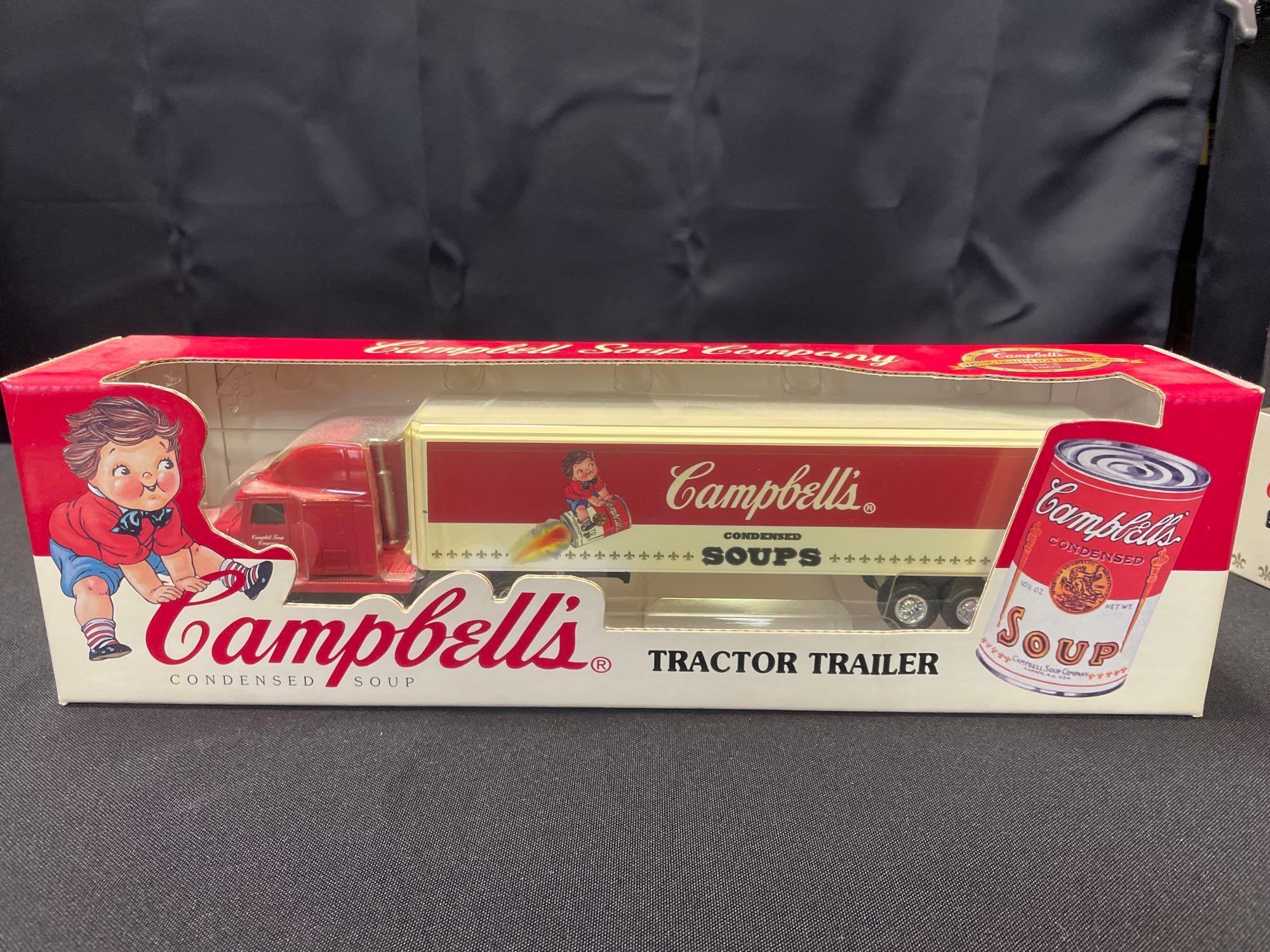 Campbells soup bobble heads (2), pencil sharpener, toy truck
