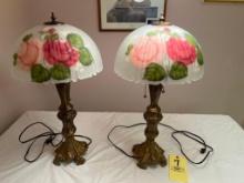 Pair of modern reverse painted lamps with metal base