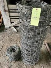 Roll Barbwire and partial Roll of woven Fence
