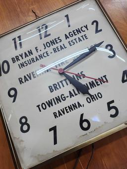 Vintage Ravenna tire service & insurance advertising clock