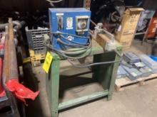 Miller spot welder with timer on metal bench, 230V 1PH. Working condition.