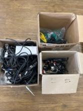 3 boxes of power cables and cords
