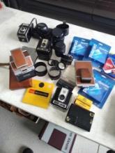 Cameras, Polaroid Land SX-70 (2), Film, Brownie, Lens,