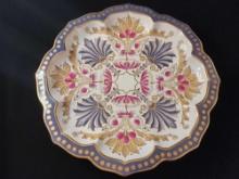 18" across hand painted and gilt gold charger plate. possibly Maitland-Smith