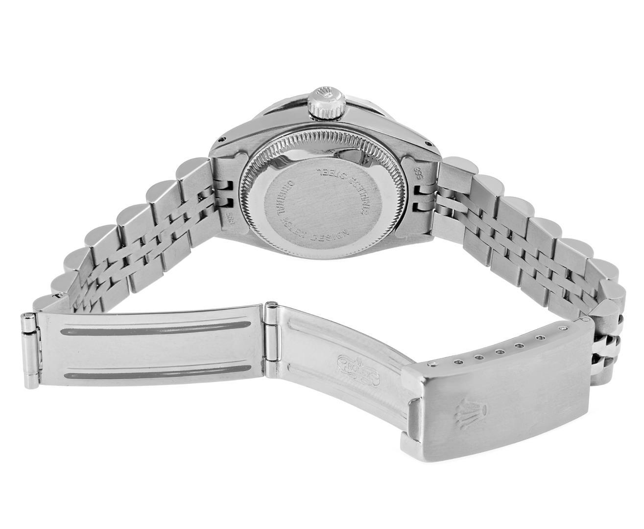 Rolex Ladies Stainless Steel Silver Index 18K White Gold Diamond Bezel Date Watc