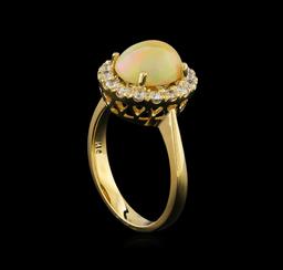 1.70 ctw Opal and Diamond Ring - 14KT Yellow Gold