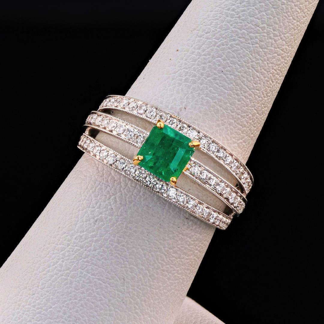 0.70 ctw Emerald and 0.48 ctw Diamond 18K White and Yellow Gold Ring