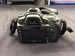Nikon D90 digital camera with battery and nikon dx 35mm lens
