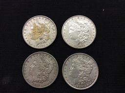 4 U S one dollar coins,years 1884,1886,1887,1885