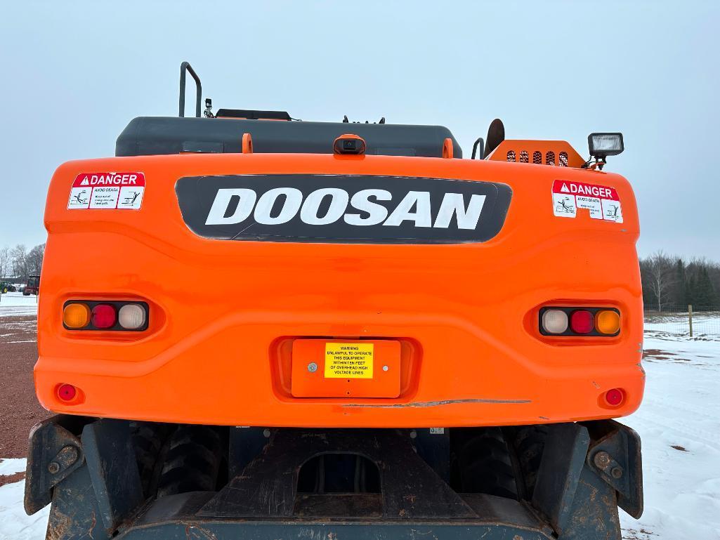 2013 Doosan DX190W-3 wheel excavator, cab w/AC, 7'7" stick, front blade, 10.00x20 tires, 36" quick