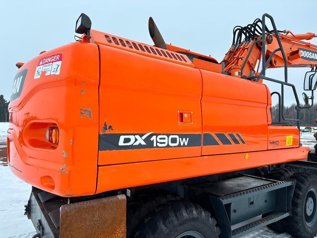 2013 Doosan DX190W-3 wheel excavator, cab w/AC, 7'7" stick, front blade, 10.00x20 tires, 36" quick