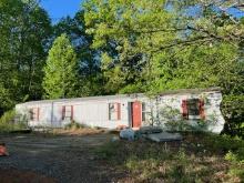 Single wide mobile home Buyer must move or scape it there Bill of sale no title / not livable