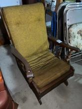 Antique chair with wood upholstery