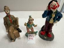 3 clown statues