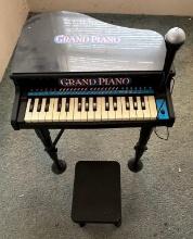 Toy Grand Piano with a Microphone and Stool