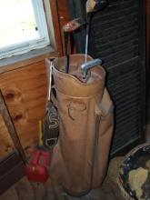 Golf caddy and clubs