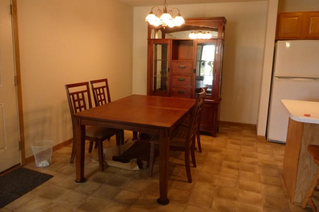 Table with leaf and 4 chairs.  Table 60" x 42" x 30" T, leaf is 18"