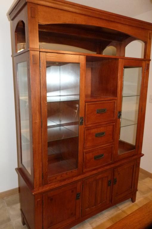 China hutch with 2 glass doors, mirrors inside and top, 3 drawers and 3 doors